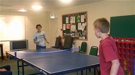 Freddie tries to prove his superiority at Table Tennis in the games room at Borrowdale Youth Hostel